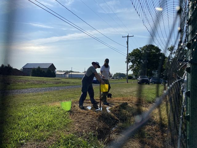 Lisa and Nick VanHorn fill buckets with water on Saturday, August 27th, as part of the RU Ready to Farm program run by the Rutgers New Jersey Agricultural Experiment Station. The husband-and-wife duo want to start their own brewery, where they will grow their own ingredients.